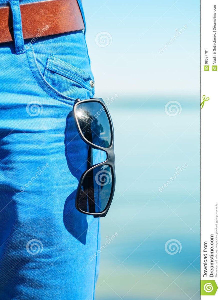 sunglasses-hanging-out-front-pocket-blue-jeans-close-up-sunny-day-beach-part-summer-wardrobe-b...jpg